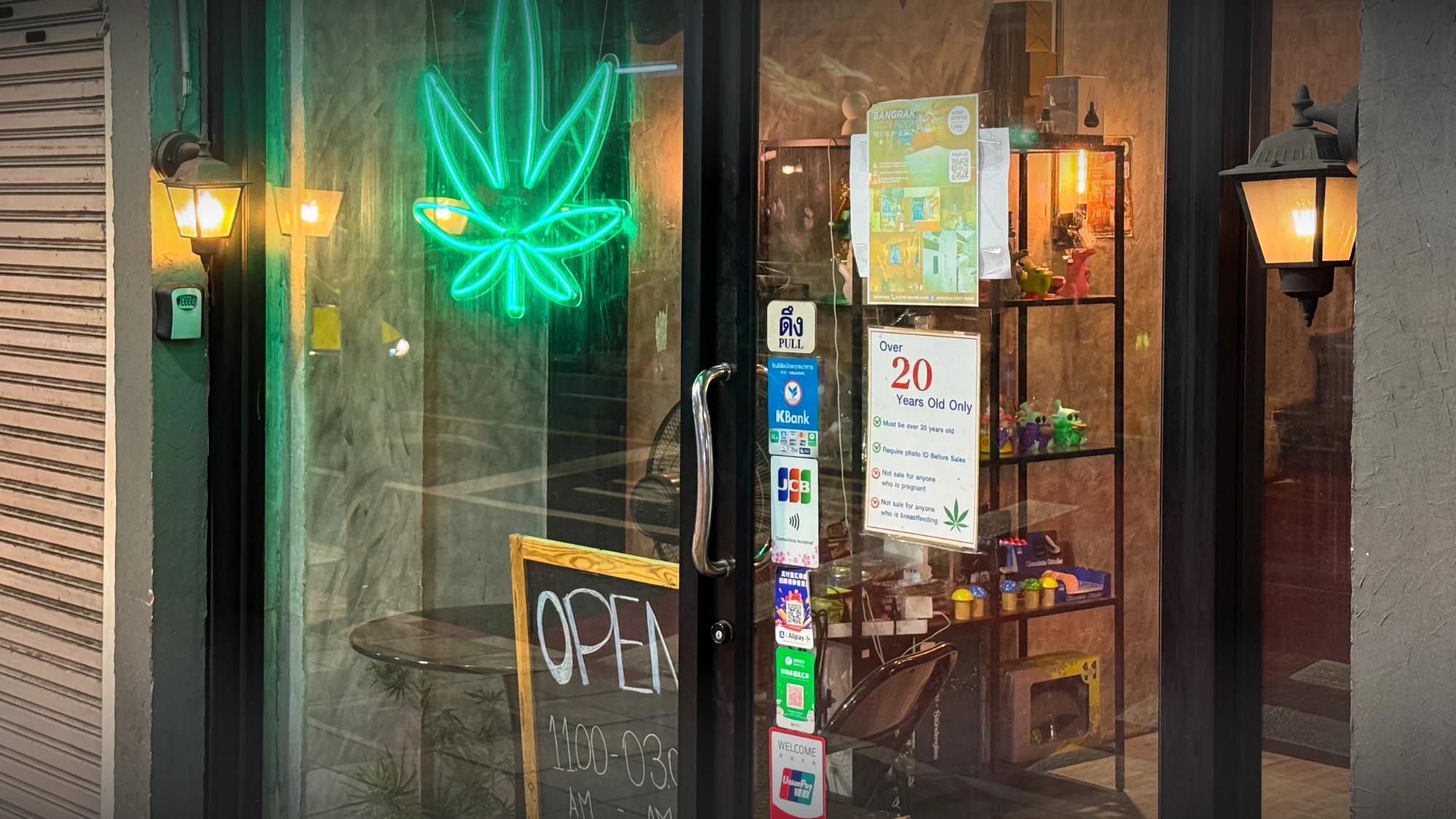 Licensed cannabis dispensary entrance with age requirement signage for customers visiting a dispensary in Antioch, California.